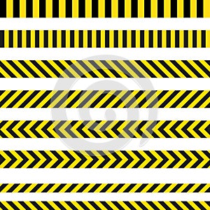 Yellow and black danger ribbons. Police line, crime scene, do not cross, construction site road