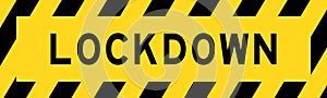 Yellow and black with line striped label banner with word lockdown