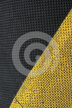 yellow and black metal texture background with some spots and spots on it