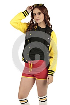 Yellow black and red colored retro sports wear with an empty space on the black shirt for you to add your brand