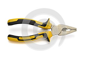 Yellow and black rubber handle pliers on white background