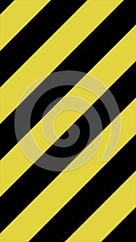 Yellow and black striped caution background in diagonal pattern