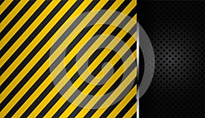 Yellow and black stripes on black perforated background metal