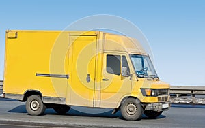 Yellow blank delivery van truck