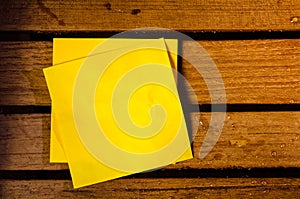 Yellow blank paper on wood pettern