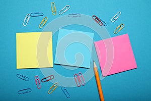 Yellow blue and pink paper note, piece blank. Empty sheet, letter