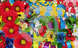 Yellow blue and red artificial flowers