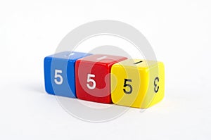 Yellow, blue and red dices for rpg, dnd or board games on white background. Number 5