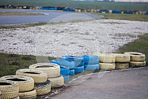Yellow and blue tires on a race track