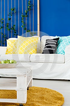 Yellow, blue and white room
