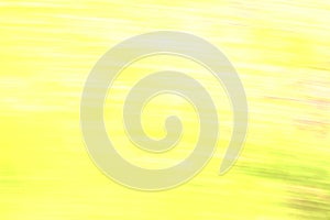 Yellow blurred abstract design background with elements of colored impurities