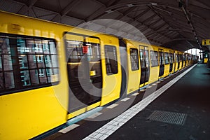 Yellow blurred subway train in Berlin