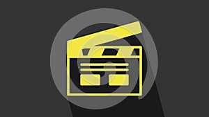 Yellow Bollywood indian cinema icon isolated on grey background. Movie clapper. Film clapper board. Cinema production or