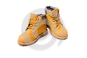 Yellow boots isolated on white background