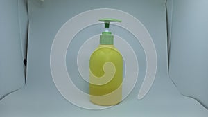 yellow bottle where to store liquid soap for washing hands