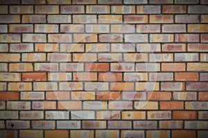 A yellow brick wall. The brick wall painted in yellow. 3