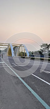 yellow bridge in the sunset of kota baru parahyangan west bandung padalarang photo