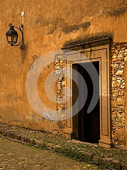 Yellow Brown Adobe Wall and Door Plus Lantern