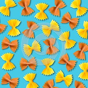 Yellow and brown farfalle pasta pattern on vibrant turquoise background
