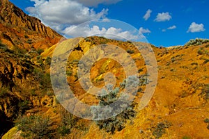 Yellow and brown mountain valley canyon Skazka in Kirgyzstan photo