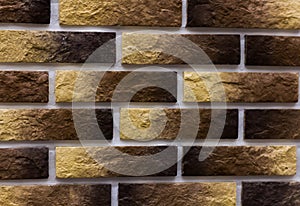 Yellow-brown tile with texture for walls, bricks