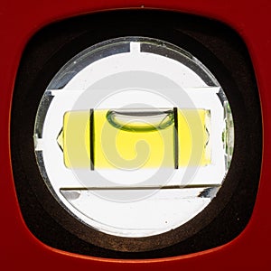 Yellow bubble level isolated on white background