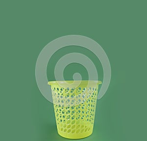 yellow bucket minimalist on green background