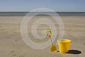 Yellow bucket and spade