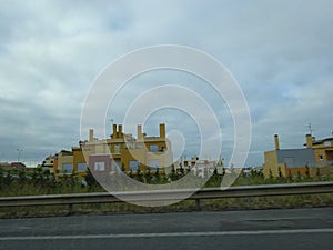 Yellow building exteriors - Portugal highways 