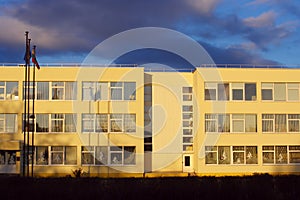 Yellow building school and blue sky