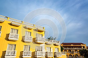 Yellow Building, White Balconies