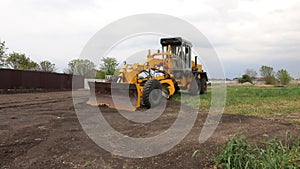 Yellow bulldozer with bucket. Wheel loader. Yellow front loader. Heavy equipment machine. Tractor front loader