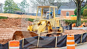 Yellow Bulldozer on Dirt Site photo