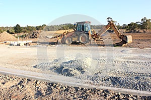 Yellow bulldozer road grader
