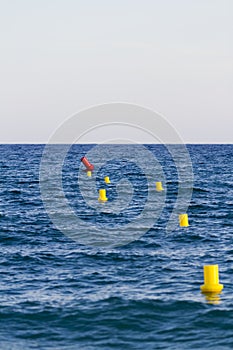 Yellow buoys in the sea