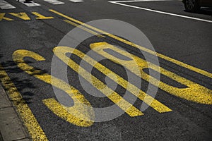 Yellow bus sign on the road