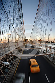 Yellow cab on Brooklyn bridge