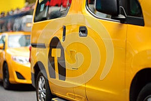 Yellow cab cars in traffic on Times Square in Manhattan, New York, USA