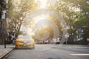 Yellow cab parked on the streets of NYC