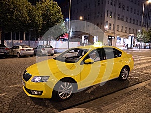 Yellow Cab or Taxi on Wenceslas Square at Night in Prague