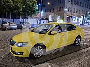 Yellow Cab or Taxi on Wenceslas Square at Night in Prague