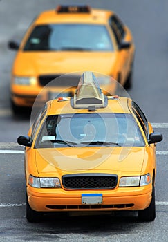 Yellow cabs in city photo