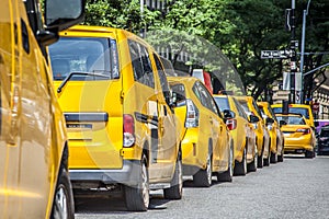 Yellow cabs parked waiting for customers in NYC