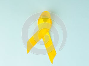 Yellow cancer awareness ribbon as symbol of childhood cancer awareness, Support the Troops Ribbon