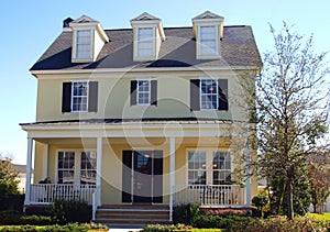 Yellow cape cod style dream home