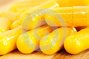 Yellow capsules. photo