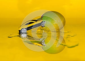 the yellow car strikes in yellow egg, creative Easter design, reflection, art idea