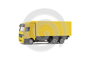 Yellow cargo delivery truck miniature isolated on white background