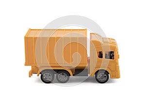 Yellow cargo delivery truck miniature isolated on white background