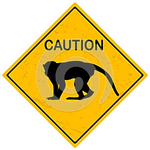 Yellow caution sign with monkey